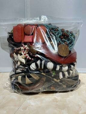 Assorted Boho Beaded and Wooden Jewelry Filled Ziploc Bag